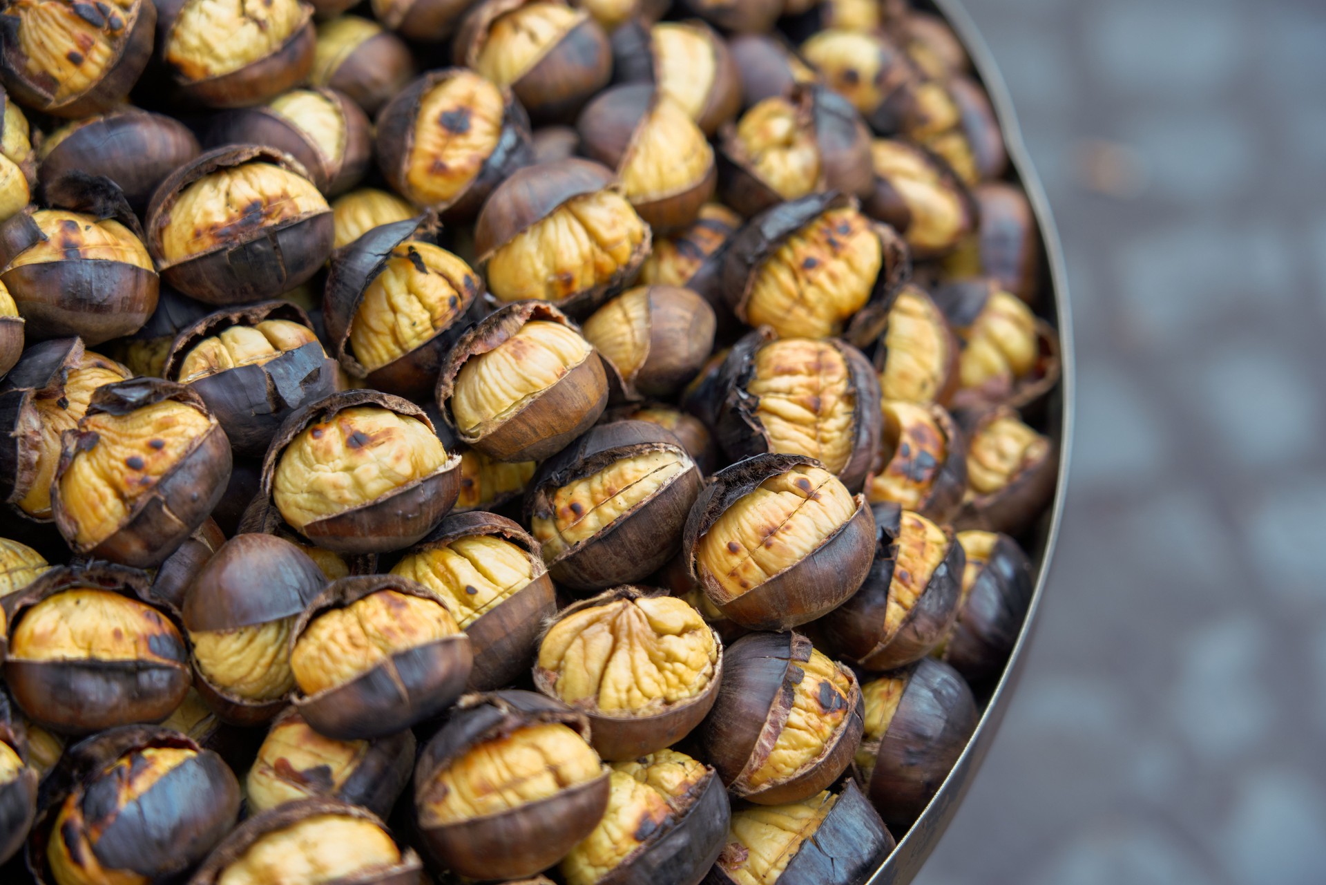 Roasting chestnuts on the street in Rome, Italy